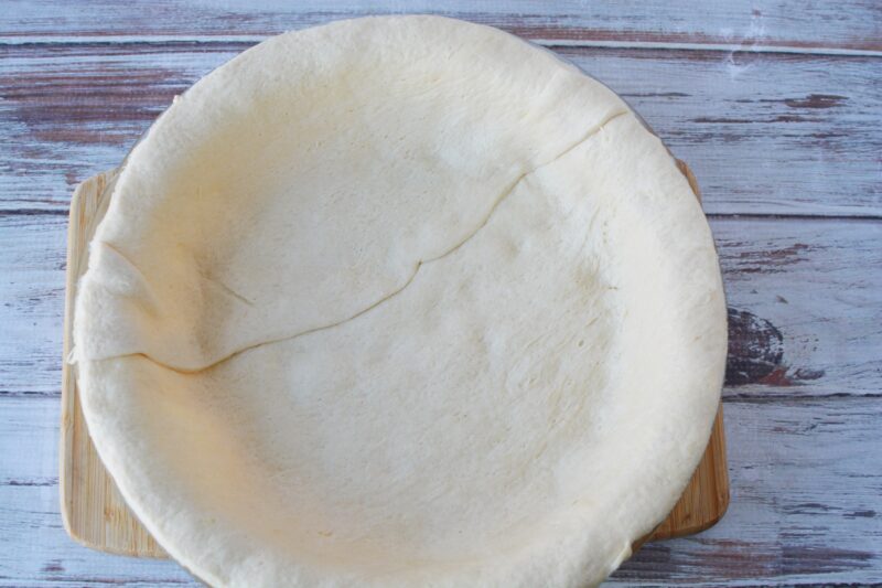 Pie pan with pillsbury crescent sheet