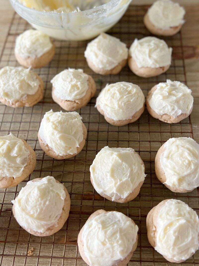 Frosting the cookies and adding garnish