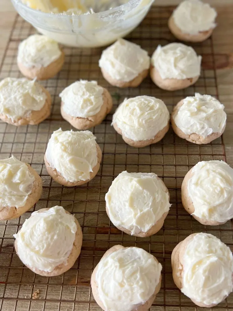 Frosting the cookies and adding garnish