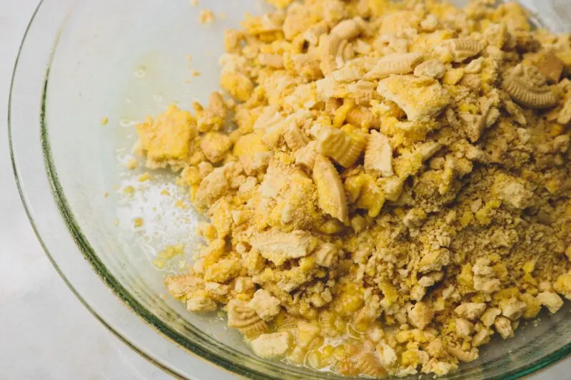 Crushing the lemon Oreos for the pie crust.