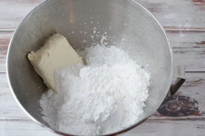 mixing the cream cheese frosting together