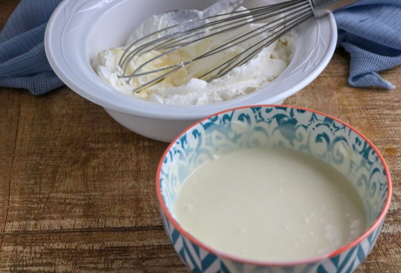 Folding whipped cream into condensed milk