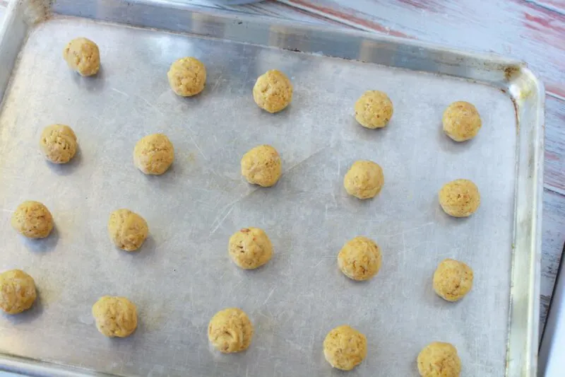 Place cookies on a baking sheet for baking