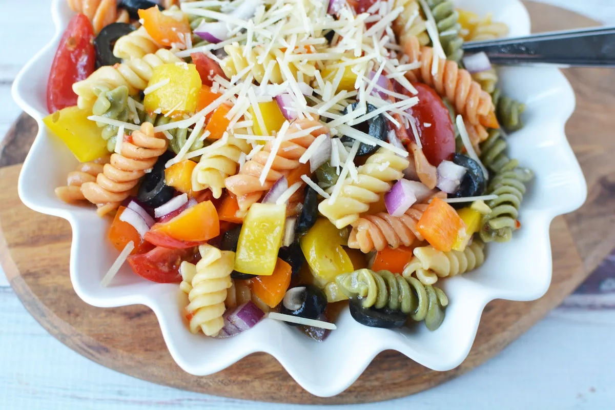 Funeral Pasta Salad Recipe with rotini, peppers, olives and Italian dressing.