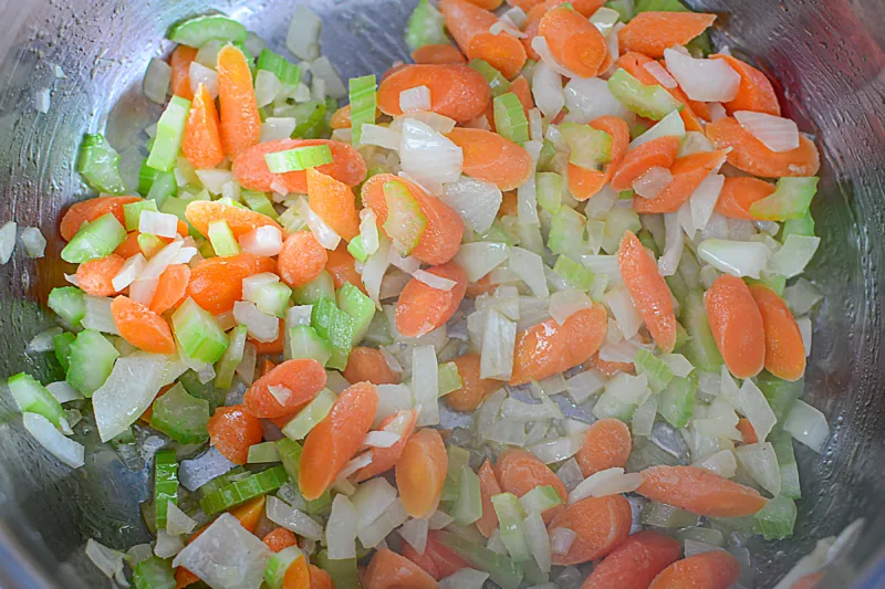 Cooking the vegetables in the pan.