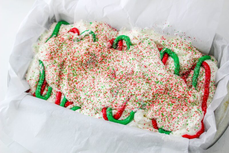 Top the ice cream with sprinkles