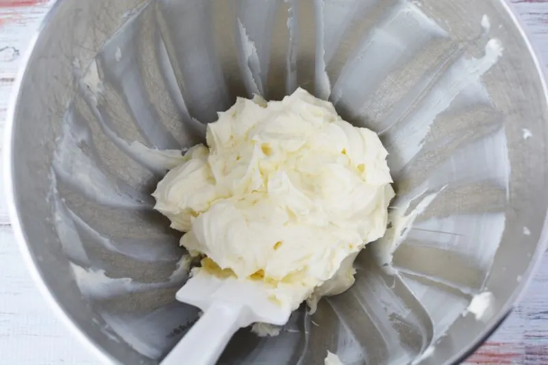 Butter and cream cheese in stand mixer