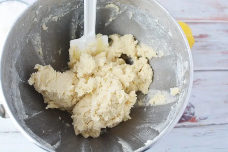 mixing the butter and sugars together in a stand mixer