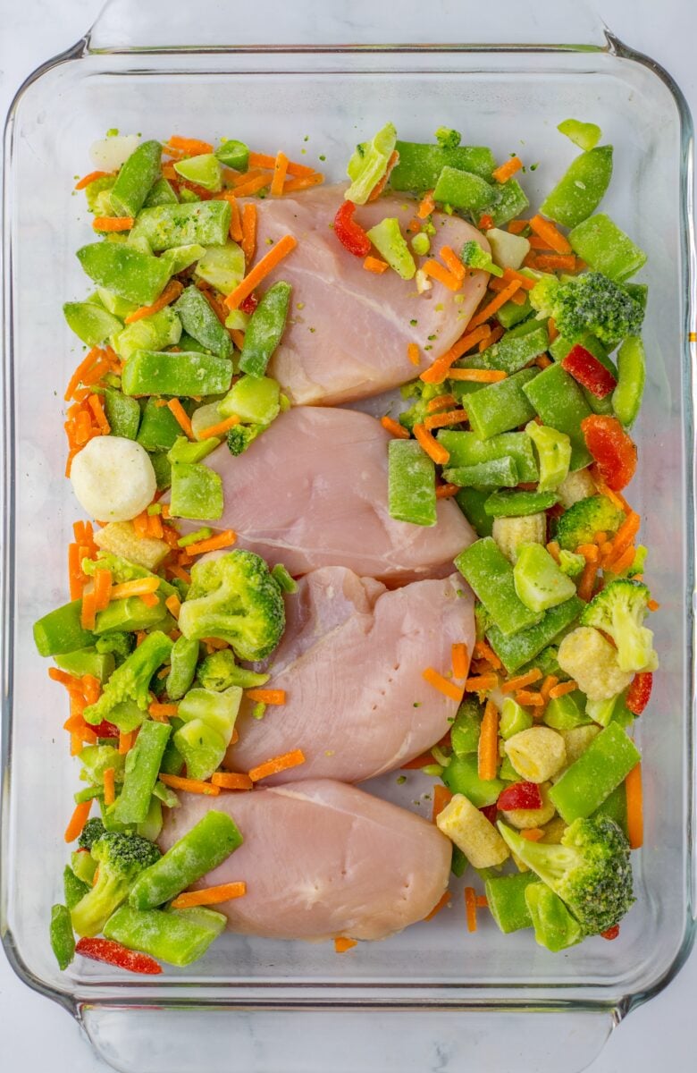 Chicken breasts and vegetables together in casserole dish
