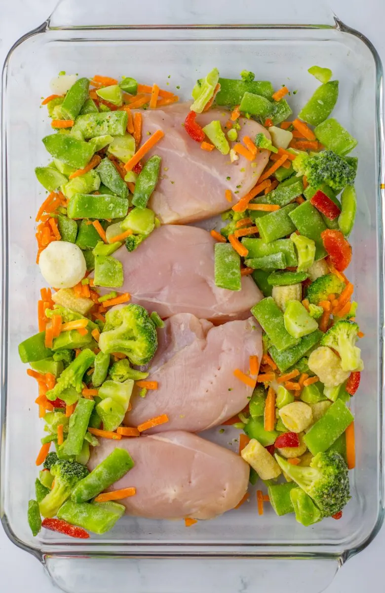 Chicken breasts and vegetables together in casserole dish