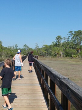 hiking with kids on a boardwalk