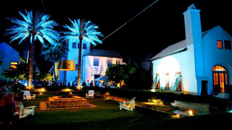 Bright lights on white buildings in Sandestin's Digital Graffiti Festival