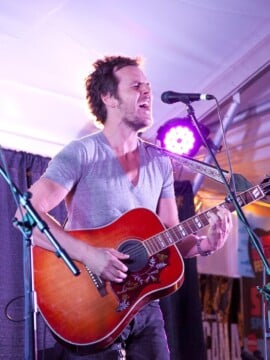 Man singing with guitar. Sandestin, Fl