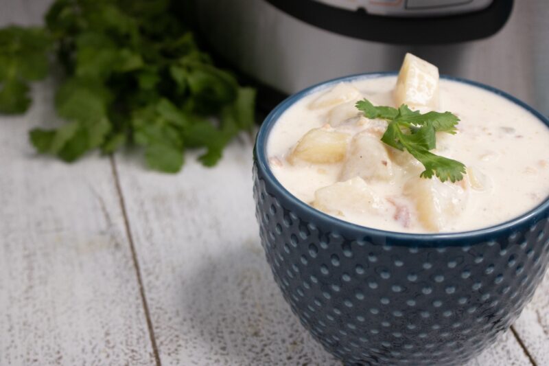 Toss some parsley on top of your Clam Chowder for color.