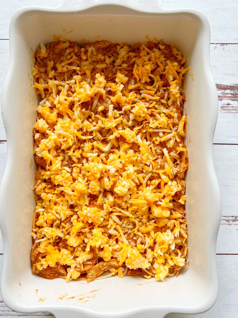 Layers of Mole Chicken Enchilada Casserole before baking.