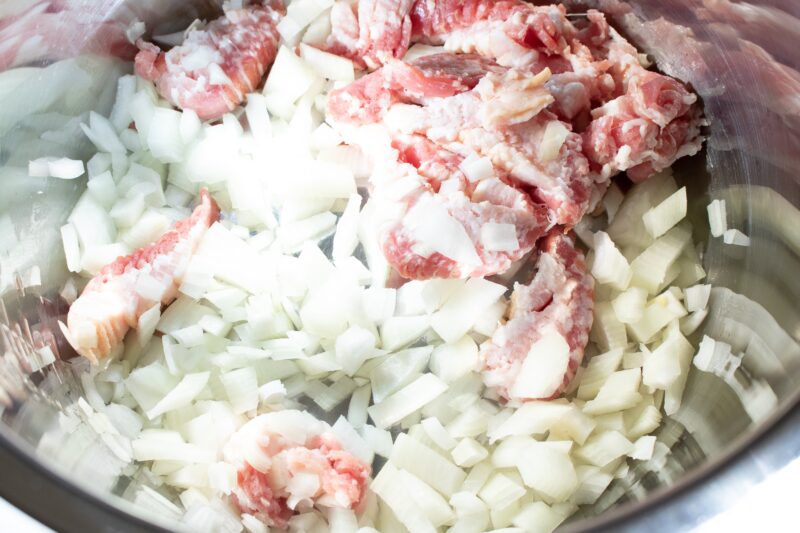 Saute the onions and the bacon together.