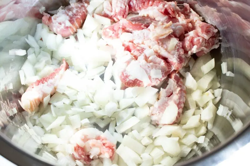 Saute the onions and the bacon together.
