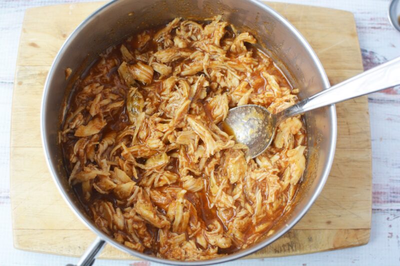 Adding the chicken to the sauce