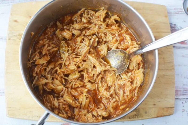 Adding the chicken to the sauce