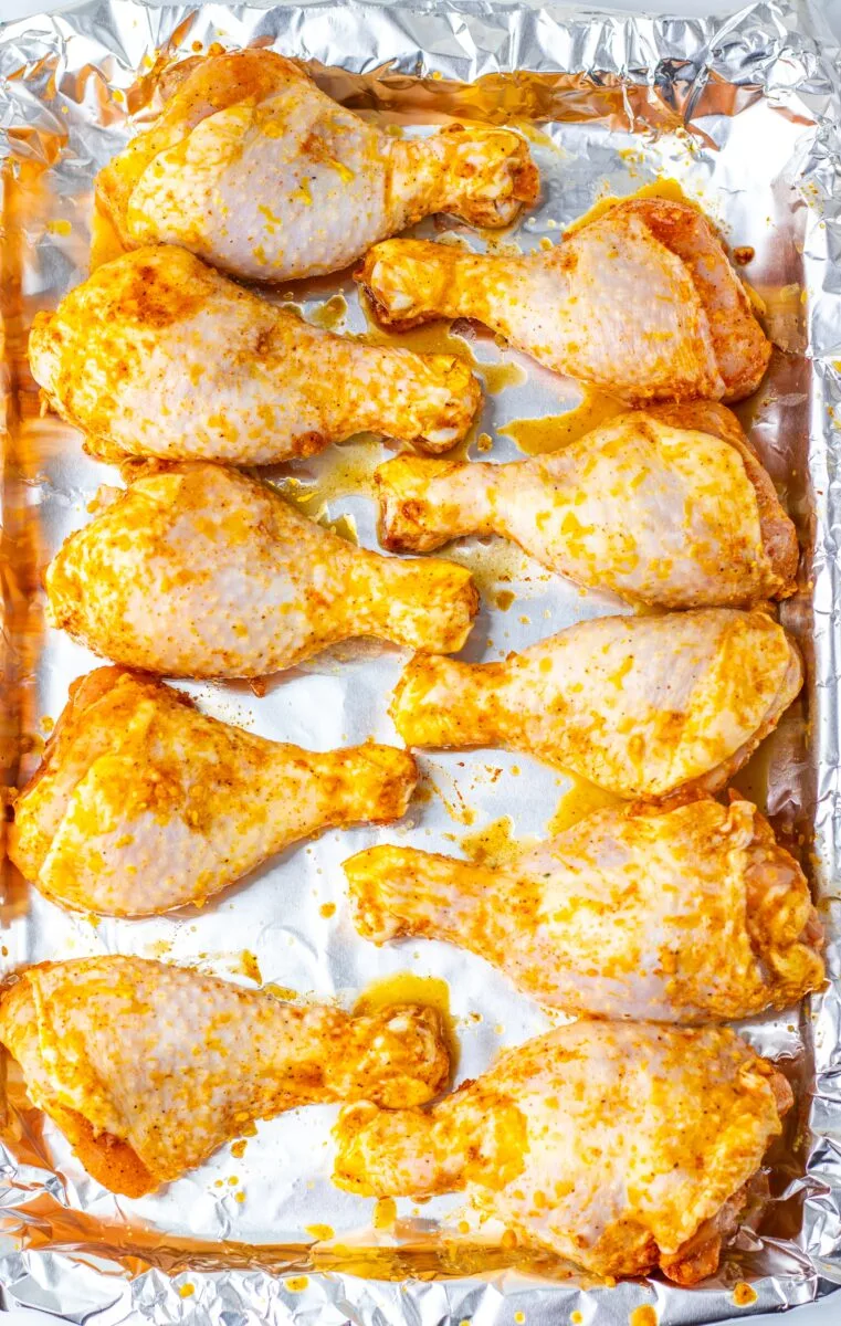 Brushing the marinade over the top