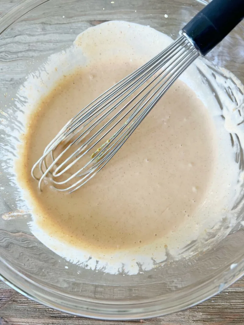 whisking together the BBQ dressing
