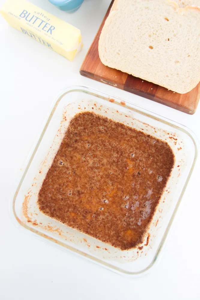 Adding the spices to the custard