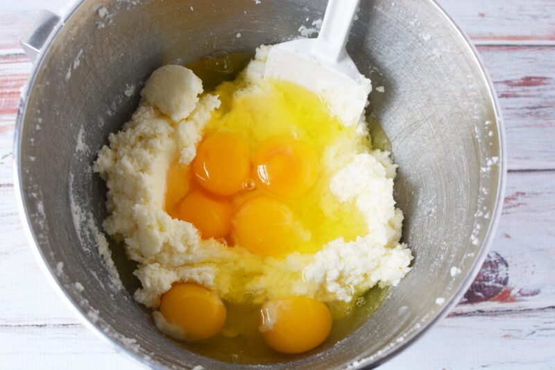 Adding the eggs and vanilla to beat well.