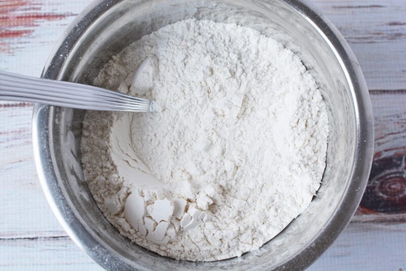 Mixing together the dry ingredients, in a mixing bowl.