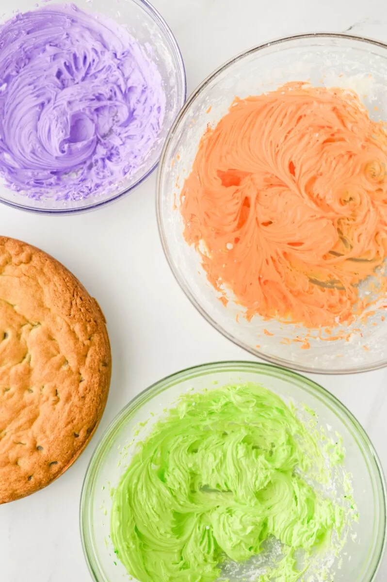 Adding gel color the white frosting