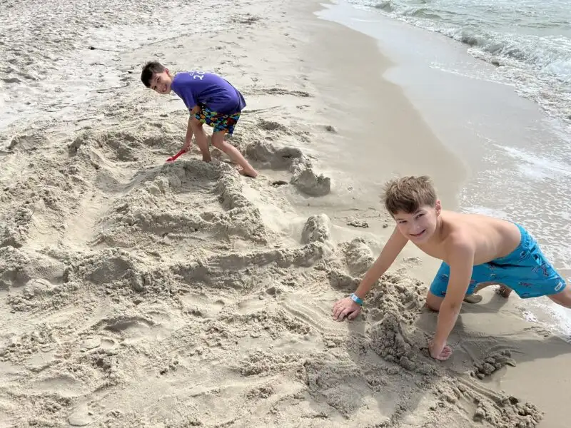 Playing in the sand at Alabama Beaches
