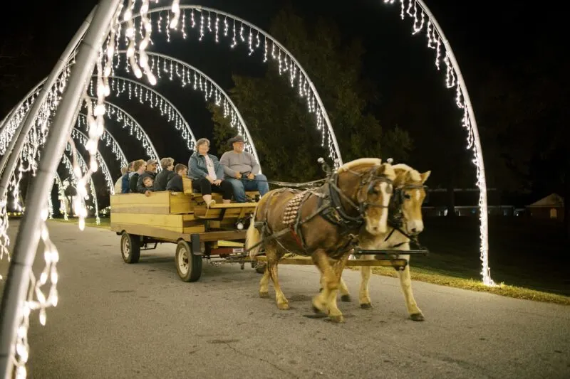 Take a horse-drawn carriage ride for small town holiday charm