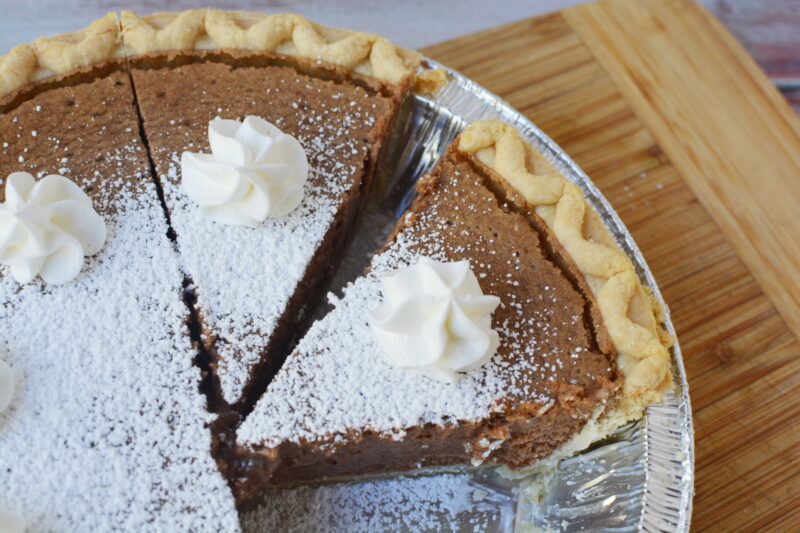 Slices of Cinnamon Pie in the container with whole pie