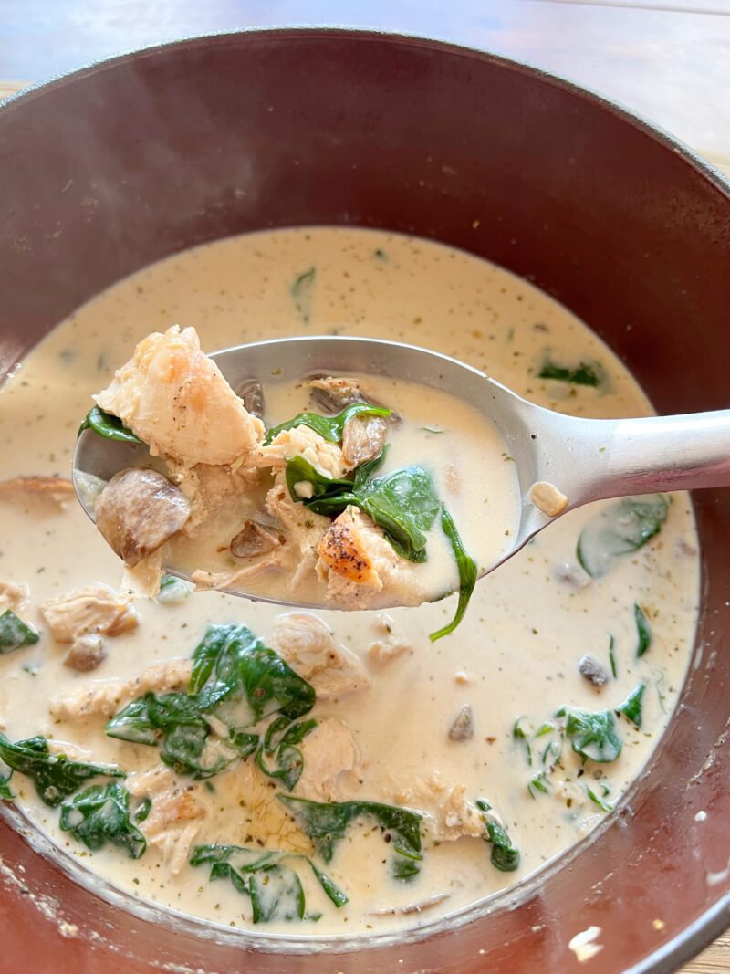 Adding the spinach to finish the soup