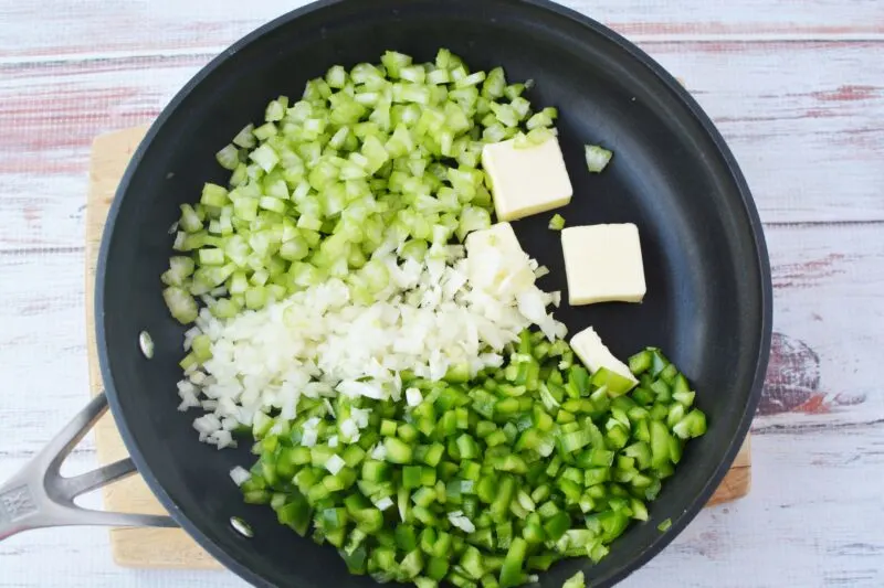Saute the onion and pepper over butter