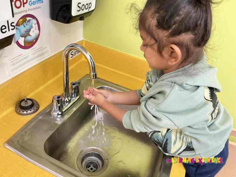 Child washing hands