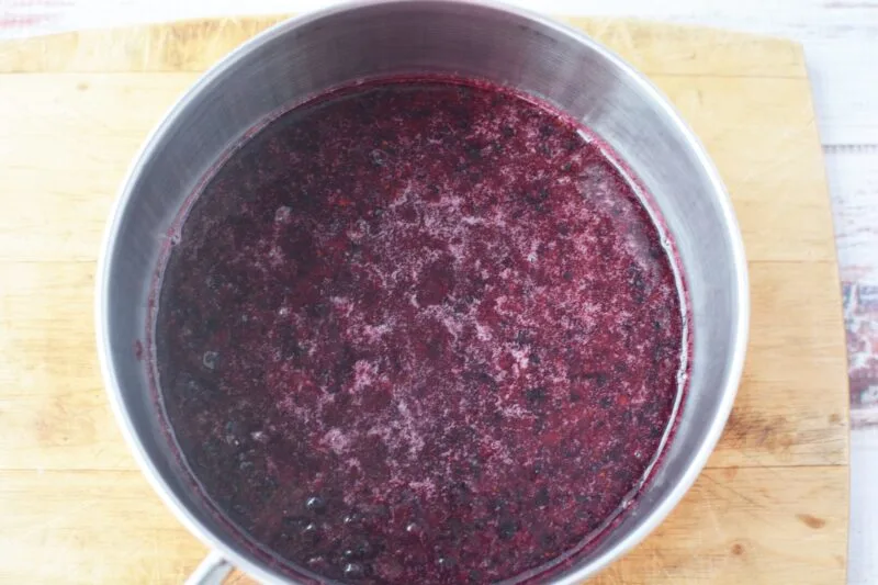 Bringing the Blueberry Mixture to a boil in a saucepan