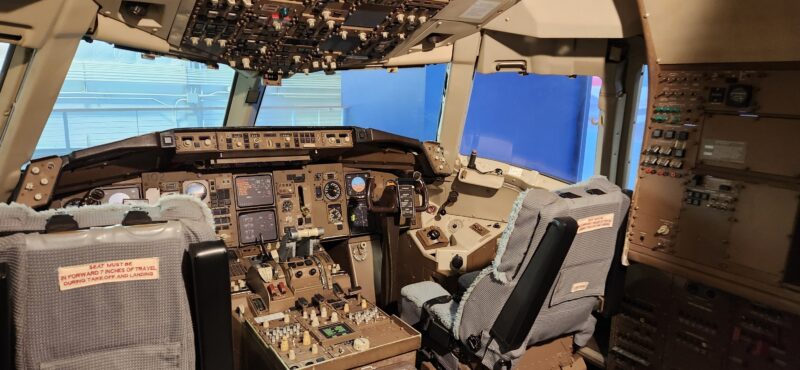 Climb into the cockpit of a plane at the Delta Flight Museum