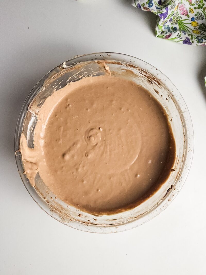 Adding cocoa powder to the mixture