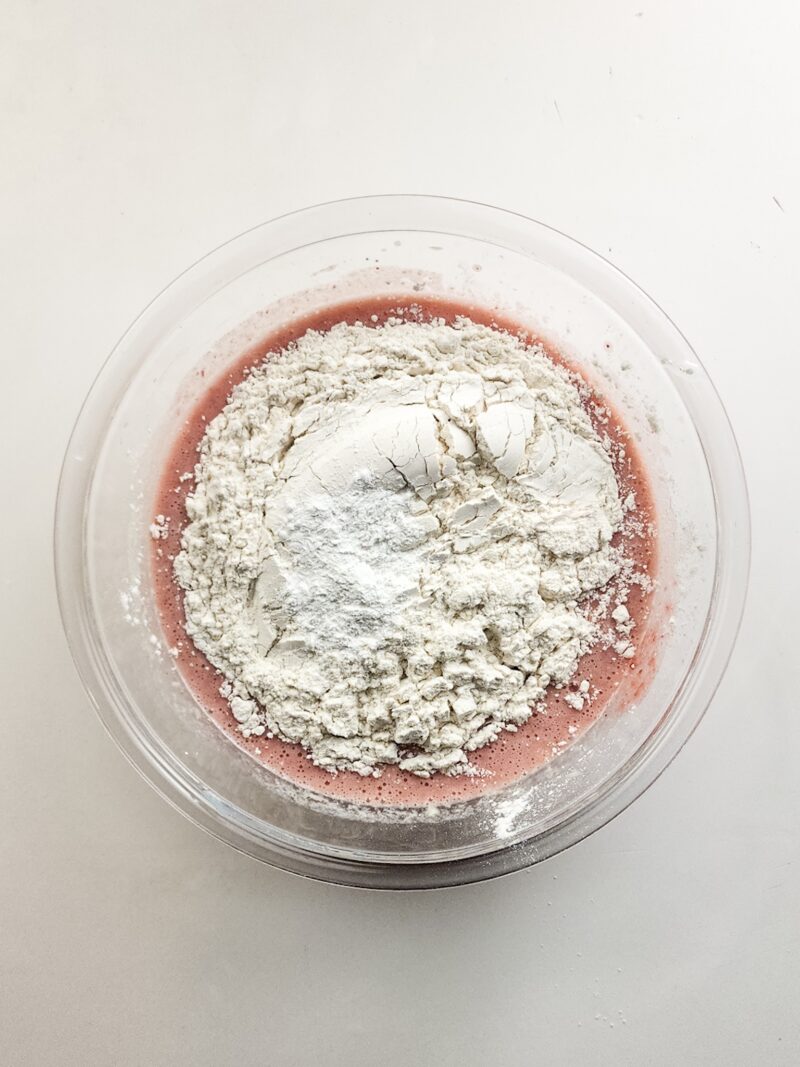 Adding the flour to the mixed ingredients
