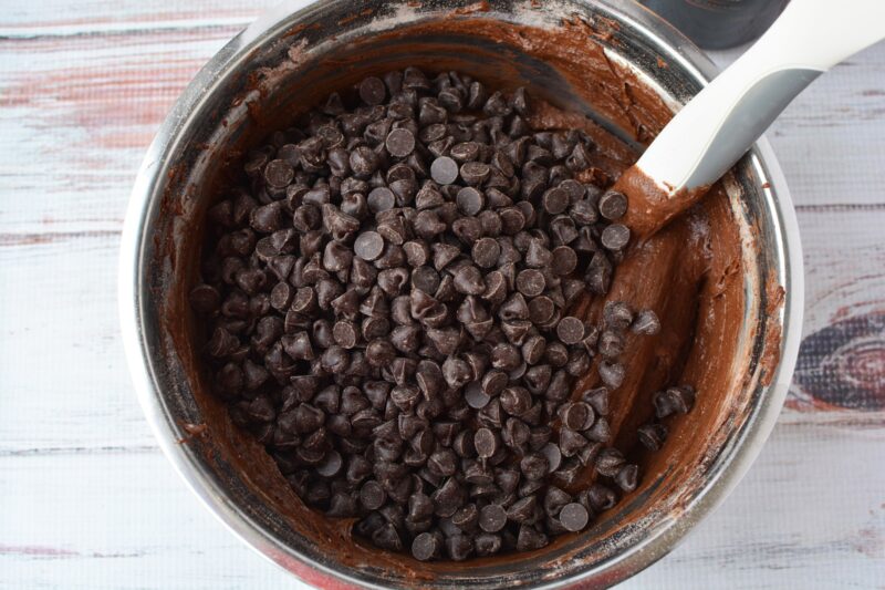 Adding the chocolate chips into the cake batter
