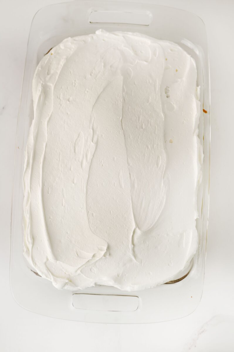 Adding cool whip to the top