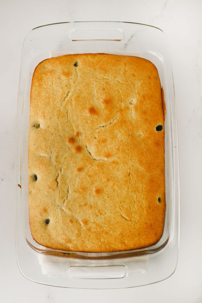 Poking the cake to add the syrup