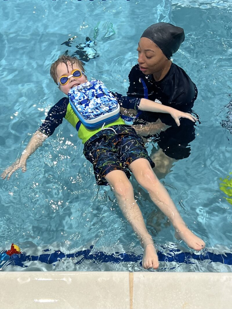 Practicing floating on his back