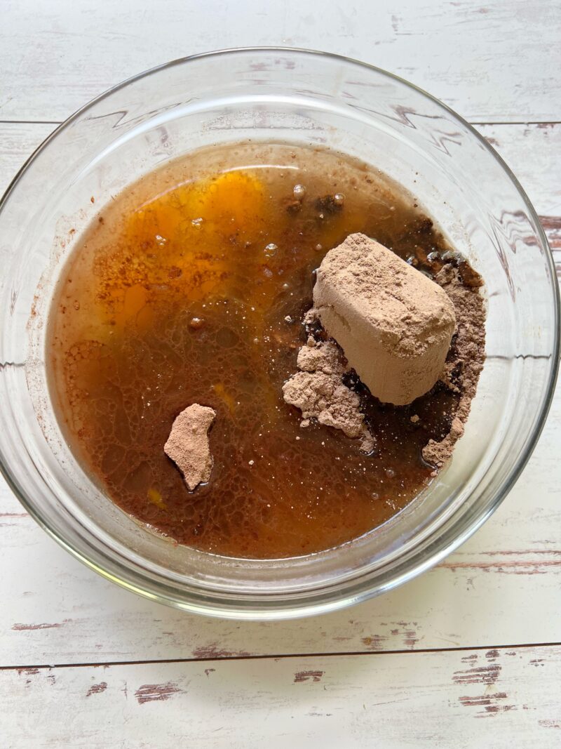 Mixing the chocolate coconut rum bundt cake ingredients together in a bowl