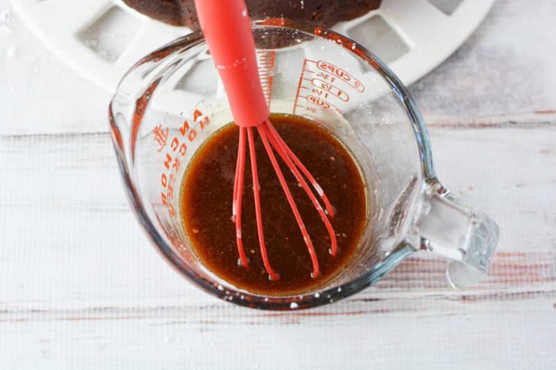 Mixing the kahlua glaze with a whisk