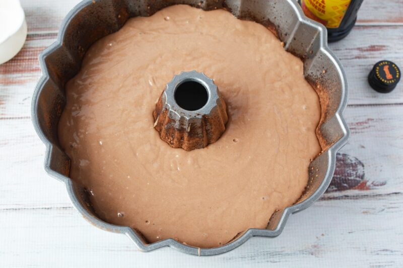 Pouring the cake into the bundt cake pan