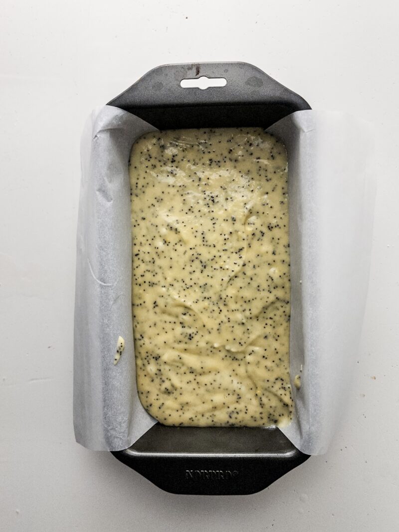 adding the batter into the loaf pan