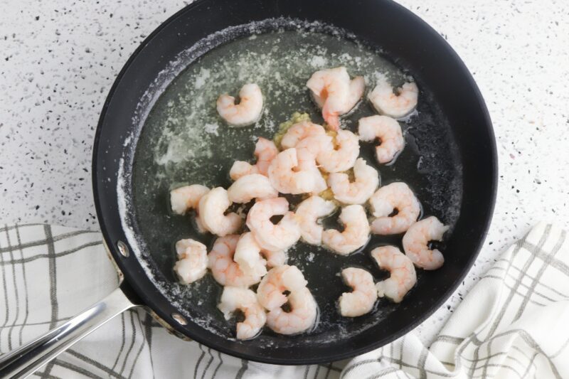 Saute the garlic, butter and shrimp together