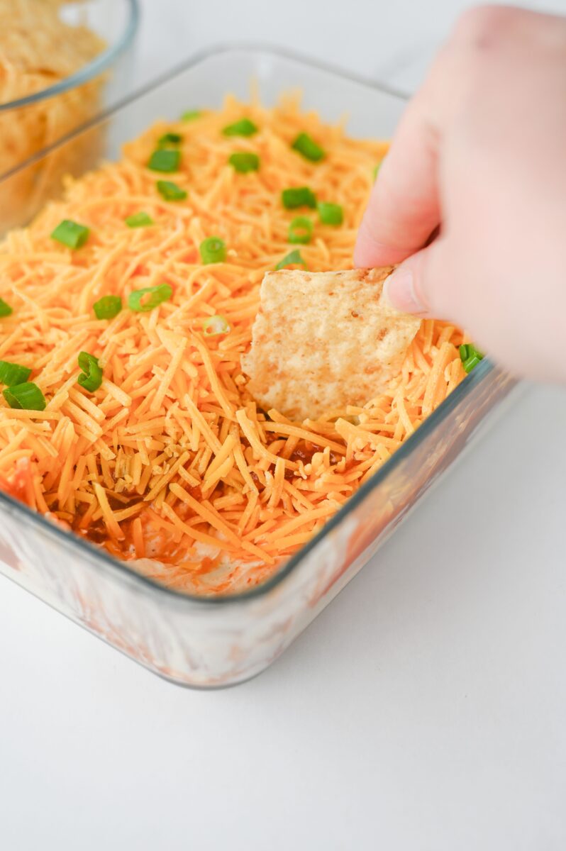 Dipping chip into the nacho dip