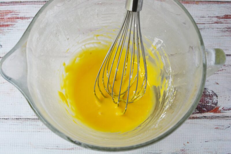 whisking togher the yolks and sugar